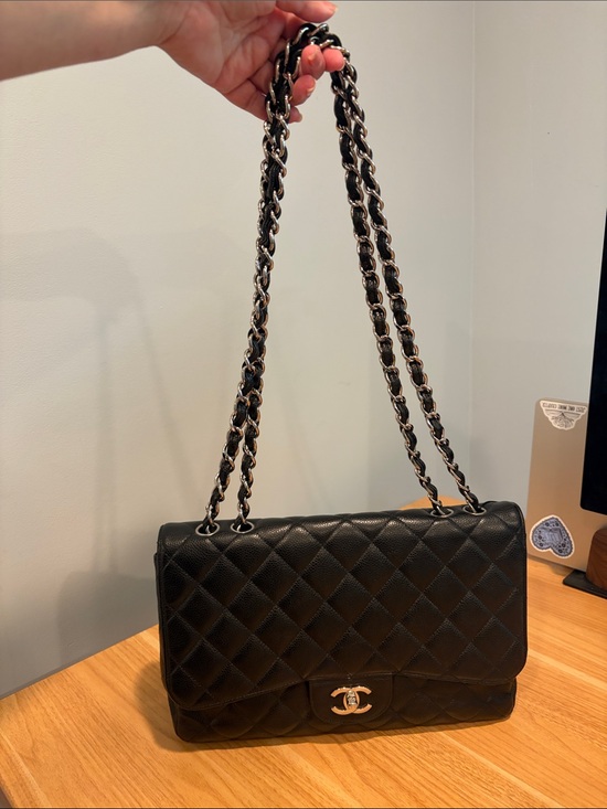 CHANEL Handbags - Pre-Loved CHANEL Black Caviar Leather Jumbo Single Flap with Silver Hardware